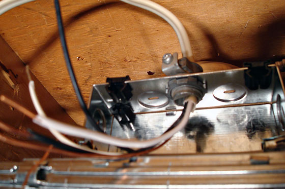 Feed wire inserted into the pot light