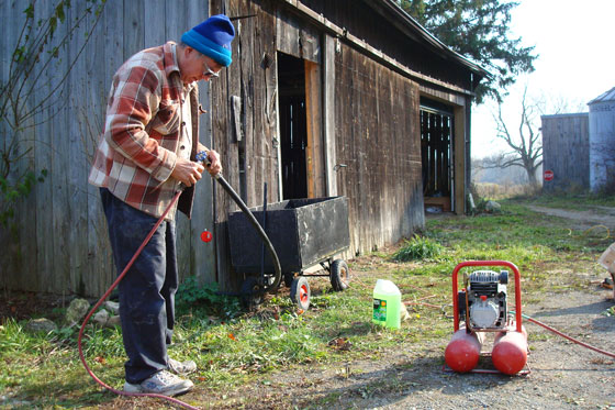 Using an air compressor to clear a water line