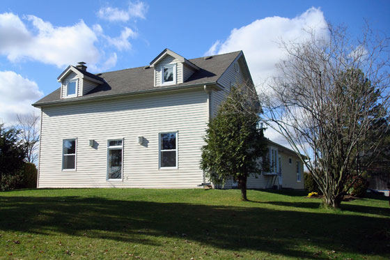 Farm house with undersized dormers
