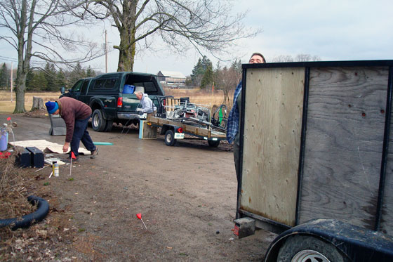 Pick up trucks and trailers full of garbage
