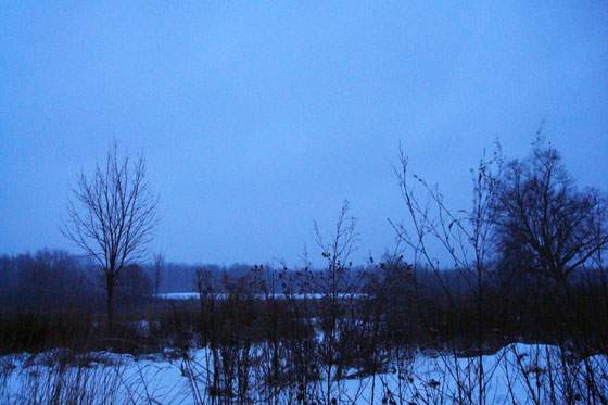Snow clouds at dusk on the farm