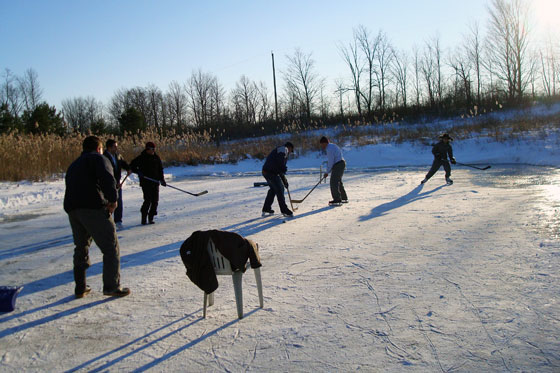 Playing hockey on a frozen pond