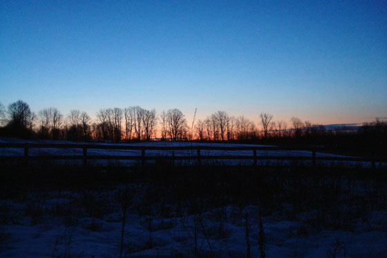 Sunrise over a snowy field