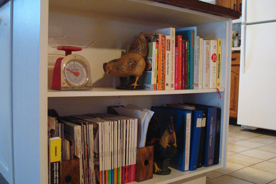 Cookbook shelf in island