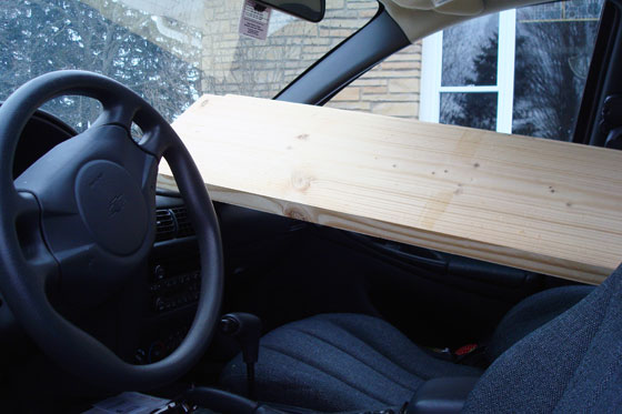Lumber loaded into a small car