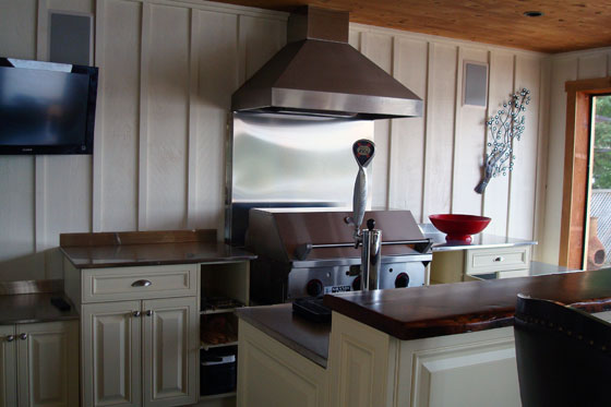 Outdoor kitchen with built in barbecue