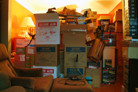 Items from the basement stacked in the dining room