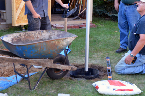 Setting a flag pole in concrete