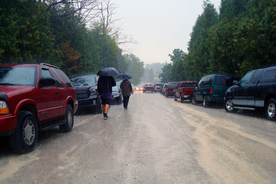 Walking down a country road in a rain storm