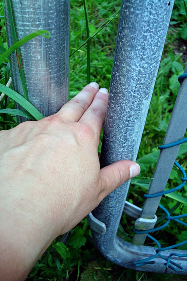 Gap between a gate and a fence
