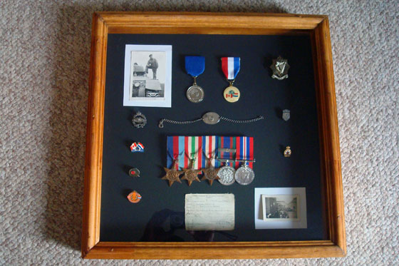 World War II medals and mementos in a shadow box