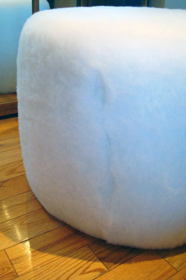 Upholstering a round foot stool