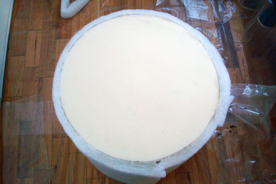 Upholstering a foot stool in batting