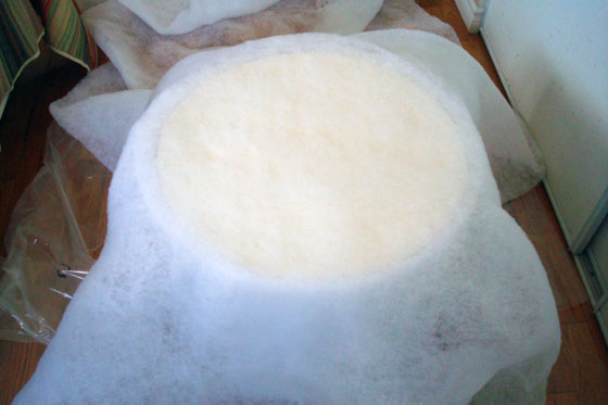 Upholstering a round foot stool