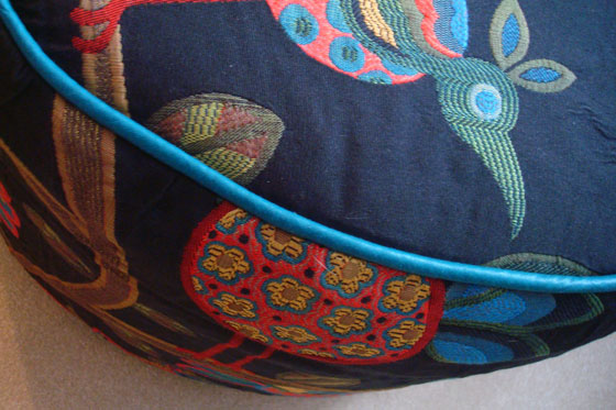 Upholstering a round foot stool