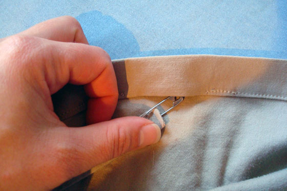 Upholstering a round foot stool