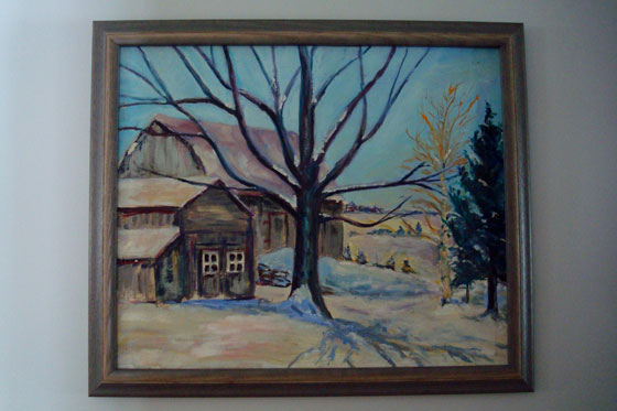 Painting of two barns in winter