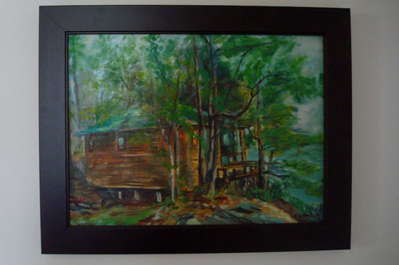 Painting of a green cottage among trees