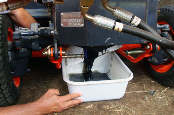 Changing the oiil on our tractor