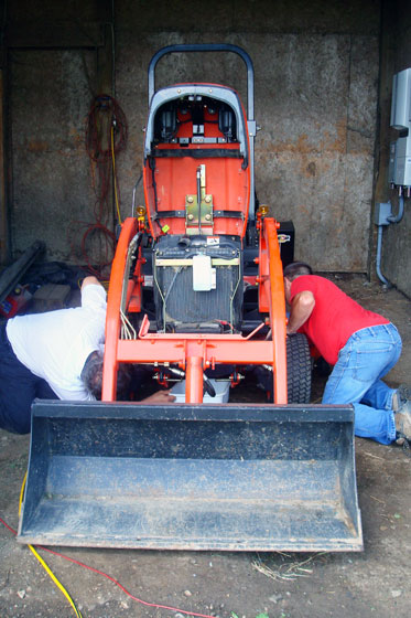 Changing the oiil on our tractor