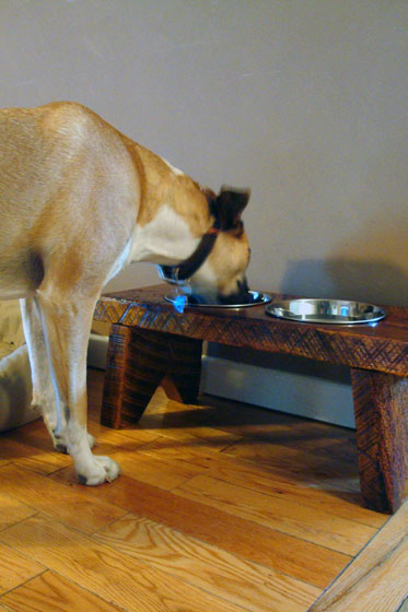 Dog food stand made of old barn wood