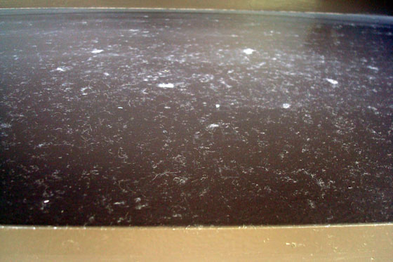 Dust stuck in bumpy paint