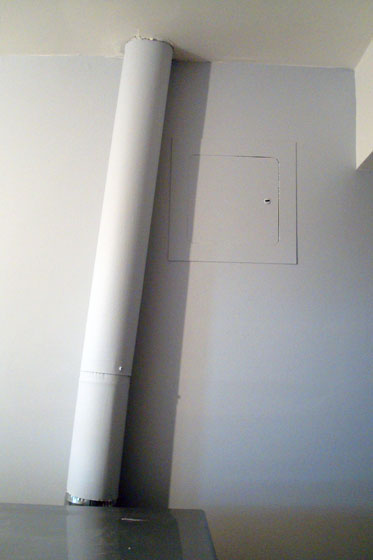 Laundry room venting running over the wall