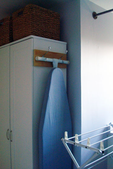 Ironing board hanger