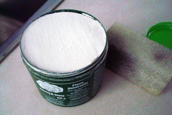 Using Universal Stone to clean a stainless steel sink