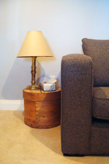 Wooden cheese crate as a low end table