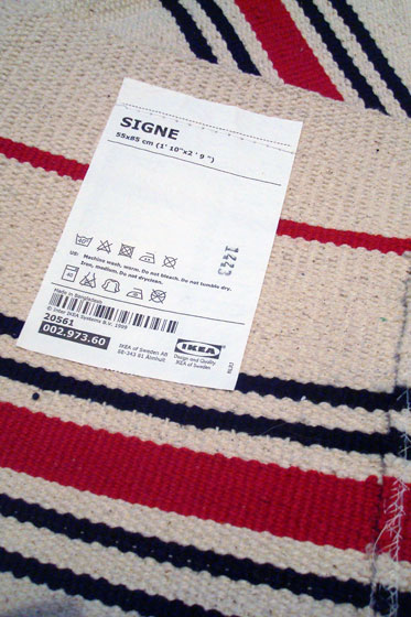 Three Ikea Signe rugs made into a runner in the laundry room