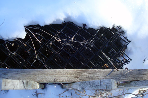 Roll of black chain link fencing