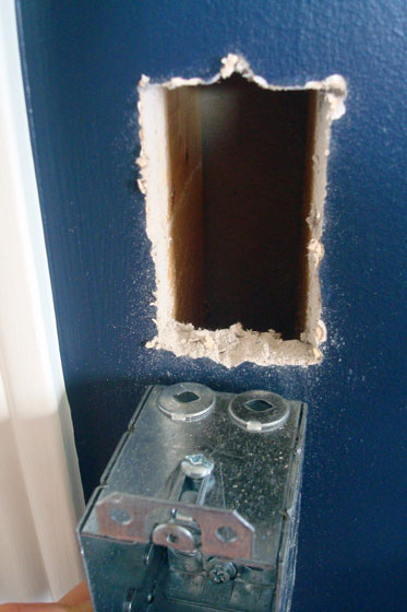 Cutting drywall for a new light switch