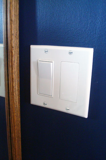 Blank plate covering a light switch
