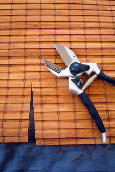 Cutting a bamboo blind