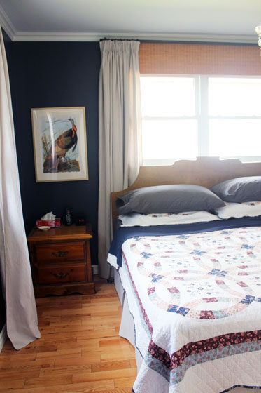 Navy, wood and white master bedroom