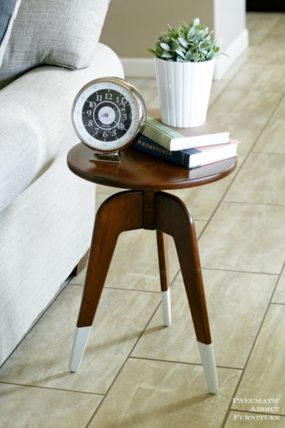Modern three-legged end table by Pneumatic Addict