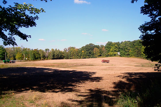 Dump truck driving across the field