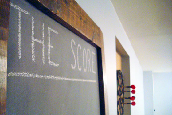 Tall chalkboard for score-keeping in the games room