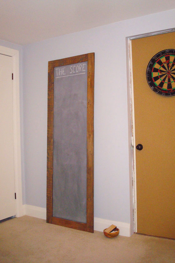 Tall chalkboard for score-keeping in the games room