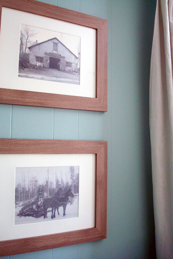 Vintage family photos displayed in the guest room