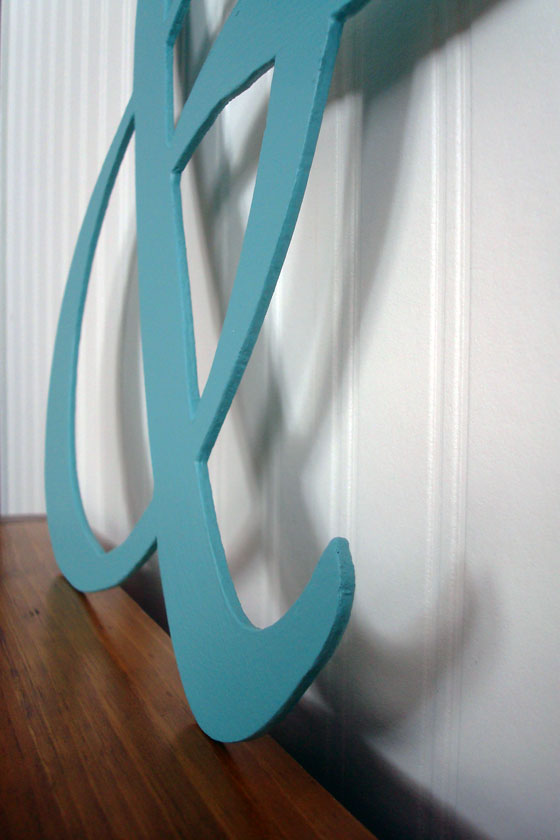 Ampersand monogram made out of hardboard