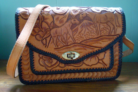Carved leather purse