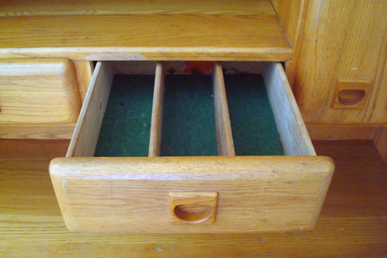 Silverware drawer in the vintage china cabinet