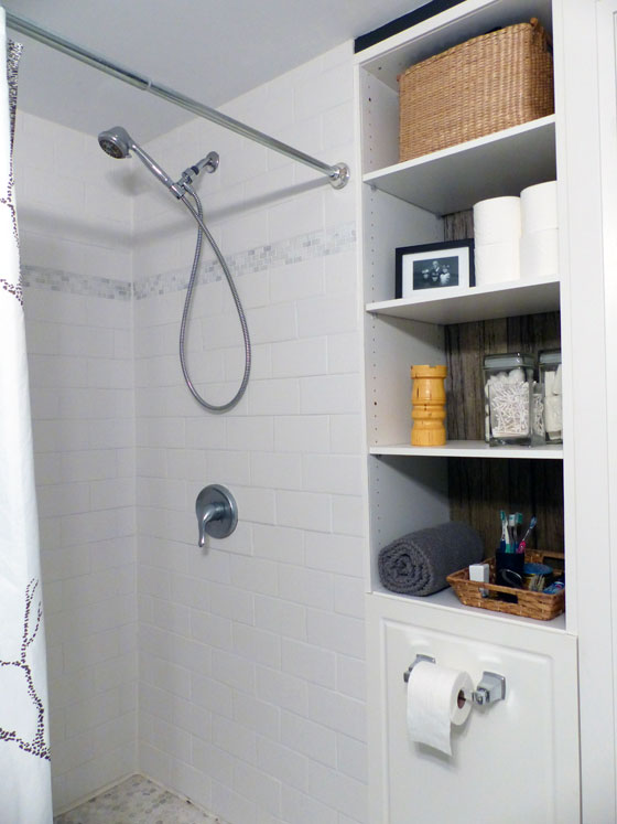 Built in shelving in a small bathroom