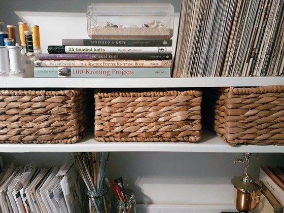 Storage baskets in the china cabinet