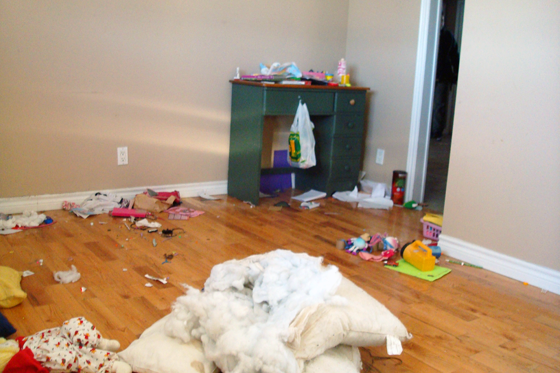 Messy office with green desk