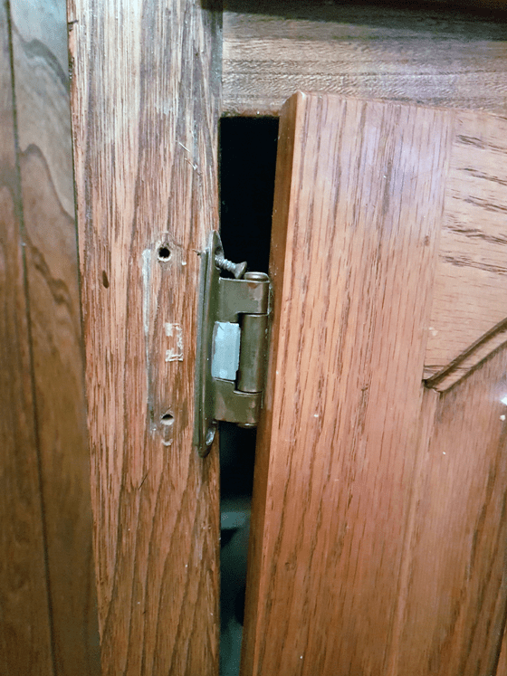 Cabinet hinge with stripped screws