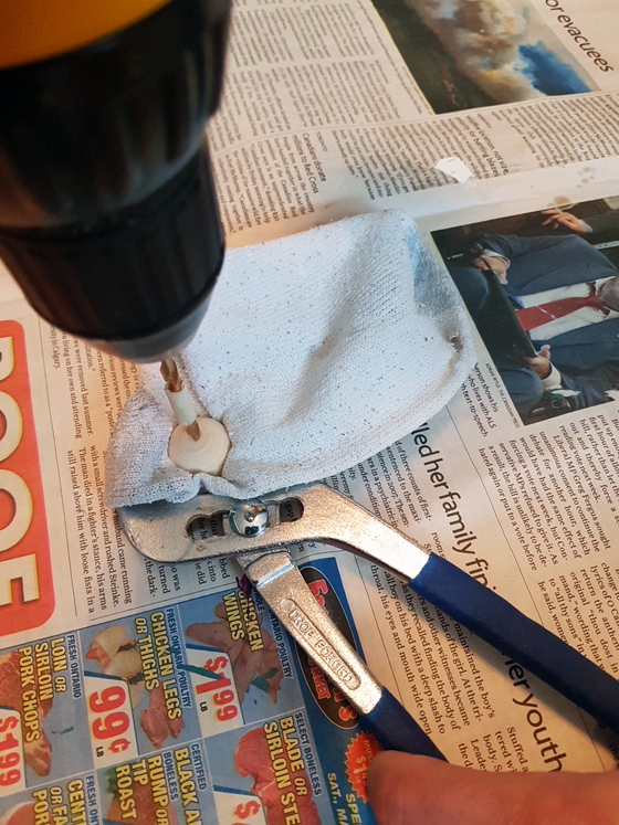 Drilling holes in wooden balls