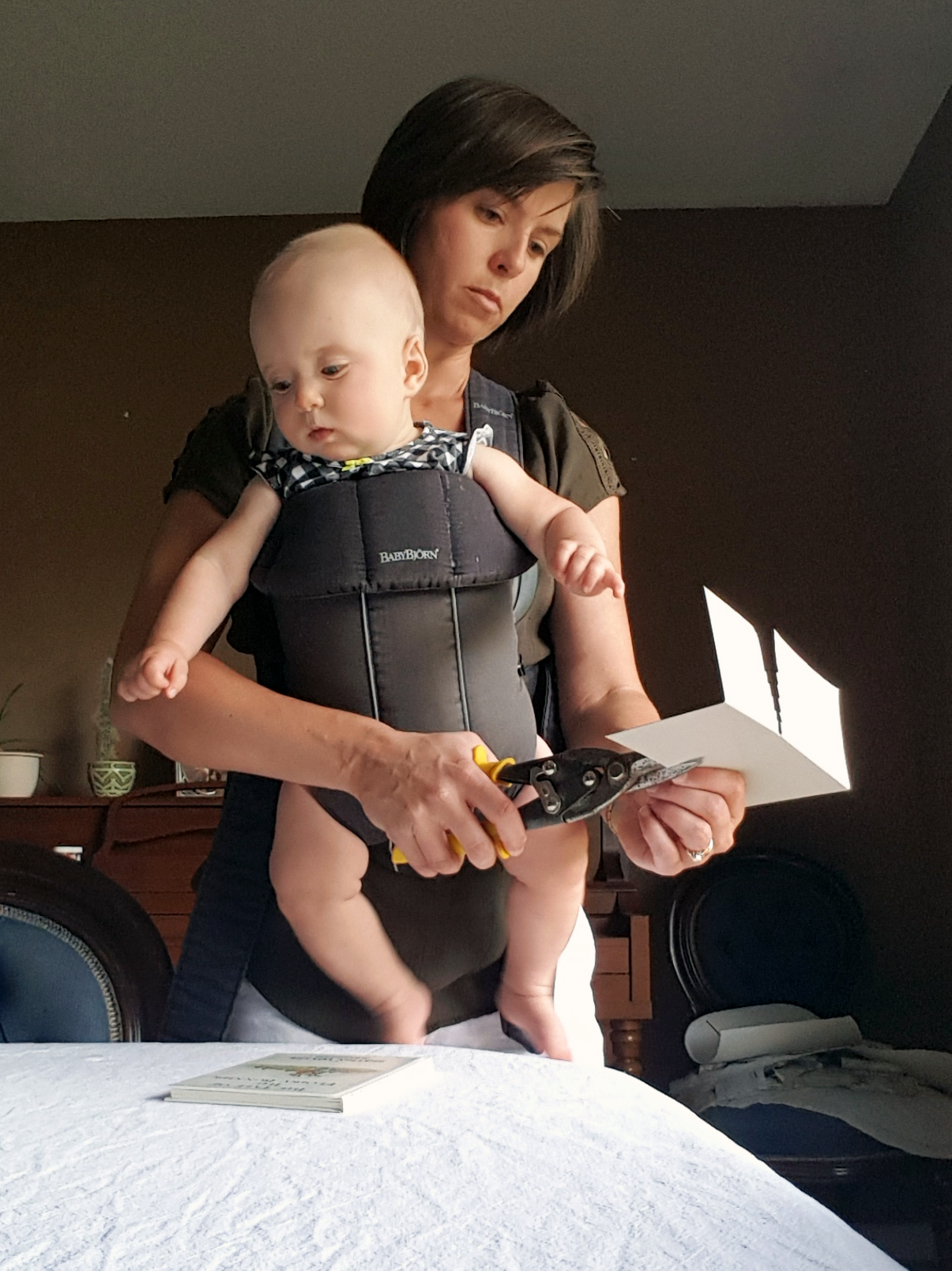 Making bookends while wearing the baby
